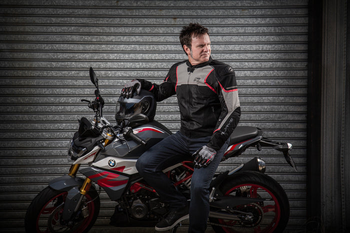 Rider wearing Rjays jacket and gloves